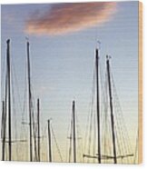 A Forest Of Sailboat Masts Silhouetted By A Setting Sun Wood Print
