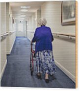 Senior Woman With Walker In A Care Home Wood Print