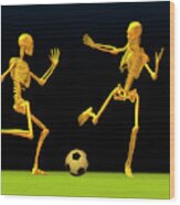 Skeletons Playing Football Wood Print