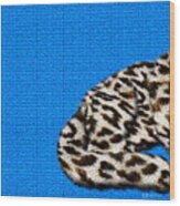 Snow Leopard Furry Bottom On Blue Wood Print