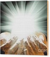 Spiritual Light In Cupped Hands On A Black Background Wood Print