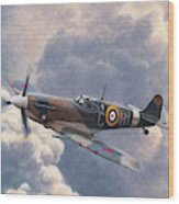 Spitfire Plane Flying In Storm Cloud Wood Print