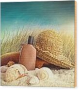 Straw Hat With Towel At The Beach Wood Print