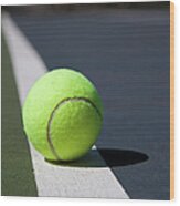 Tennis Ball On A Line In A Court Wood Print