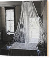Bed With Mosquito Net At Koreshan State Historic Site In Florida Wood Print