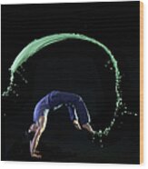 Urban Man Doing Back Flip With Green Wood Print