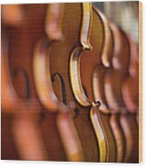 Violins In A Row In A Shop Wood Print