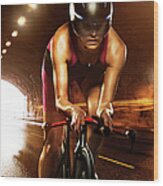 Woman Cycling Through Tunnel Wood Print