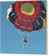 Woman Parasailing Wood Print