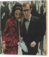 Woody Allen Posing With A Model Holding Wood Print