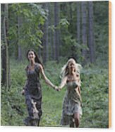 Young Women Running Through Forest Wood Print