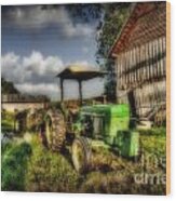 Old Tractor In Field By Barn Wood Print