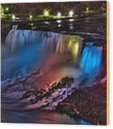 The American Falls Illuminated With Colors Wood Print