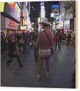 The Famous Naked Cowboy Performing In Time Square Wood Print