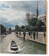 Tour Boat Passing Notre Dame Wood Print