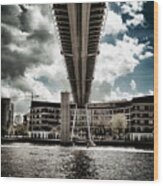 A Water Skier Speeds Past The Royal Victoria Dock Bridge #1 Wood Print