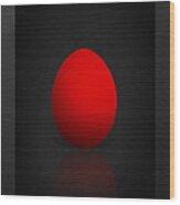 Red Egg On Black Canvas Wood Print