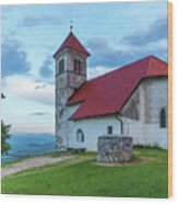 A Red Roof Church In Ljubjliana. Wood Print