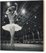 A Beautiful Ballerina Dancing In Studio Wood Print
