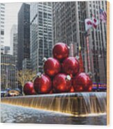 A Christmas Card From New York City - Giant Red Balls Pyramid And Radio City Music Hall Wood Print