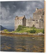 A Storm Brews Over Eilean Donan Castle Wood Print