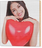 Asian Pretty Girl And A Red Heart On Whitr Islated Background Wood Print