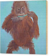 Baby Orangutan Playing Wood Print