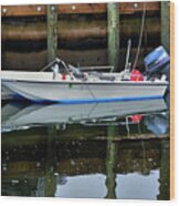 Boat On Still Water Wood Print