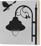 Flying Crow Vs Street Lamp Wood Print