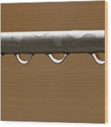 Four Water Droplets On Metal Pipe Wood Print