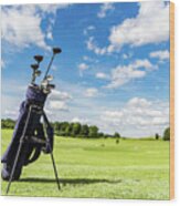 Golf Equipment Bag Standing On A Course. Wood Print