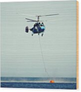 Helicopter Firefighter Take Water In The Sea Wood Print