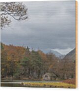 Moody Clouds Over A Boathouse On Wast Water In The Lake District Wood Print