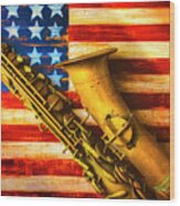 Old Saxophone On Wooden Flag Wood Print