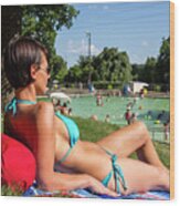 Portrait Of A Sexy Young Woman Having Sunbathing On A Beach Towel At Deep Eddy Pool, Austin, Texas Wood Print