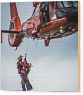 Rescuer And Victim In Hoist Wood Print
