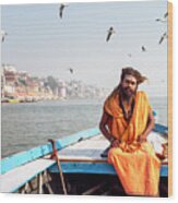 Sadhu In A Boat. Wood Print