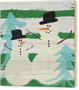 Snowmen With Blue Trees- Art By Linda Woods Wood Print