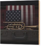 Trumpet And Flag Wood Print