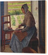 Woman Carding Wood Print