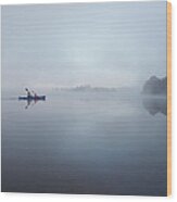 Father And Son Paddling In A Canoe On A #1 Wood Print