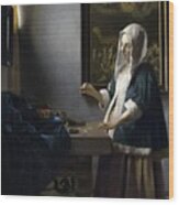 Woman Holding A Balance Wood Print