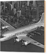 American Dc-6 Flying Over Nyc #1 Wood Print
