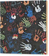 A Painting Of Colorful Handprints Wood Print