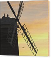 A Windmill At Cley Next The Sea, North Norfolk, Uk, At Sunset, With Raf Planes Flying Past. Wood Print