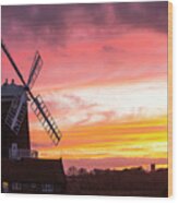 A Windmill At Cley Next The Sea, North Norfolk, Uk, With Blakeney Church In The Background At Sunset. Wood Print