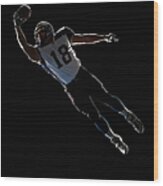 American Football Player Leaping To Wood Print