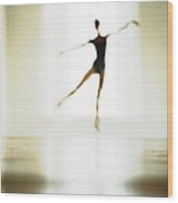 Ballet Dancer Practicing Infront Of Wood Print