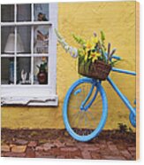 Blue Bike Against Yellow Wall Wood Print
