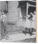 Boy Throwing Firecracker At Playmates Wood Print